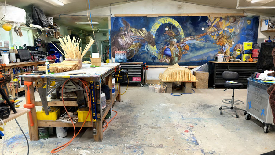 A photorealistic 3D VR rendering of an artist’s studio.