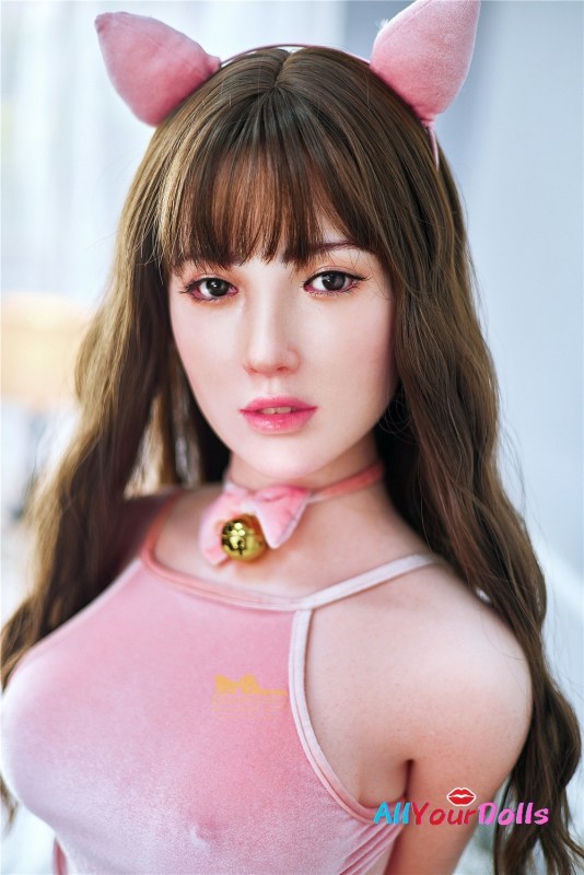 Realistic silicone doll sitting on a chair