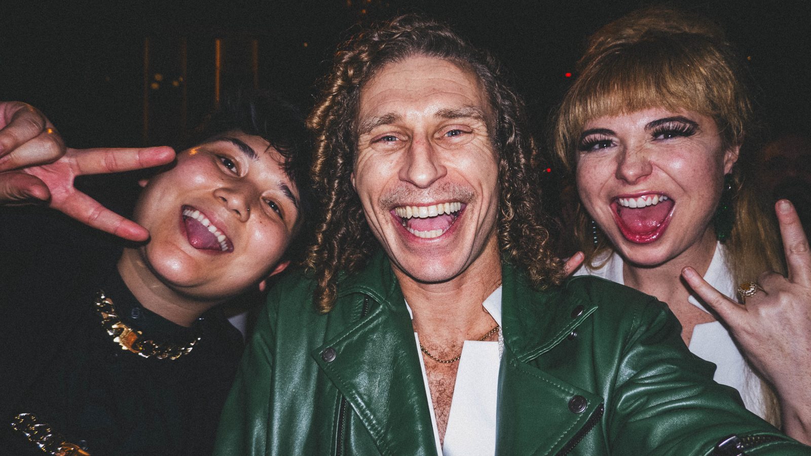 Post-event candid shot of performers