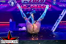Angel Beau walking on glass during her performance